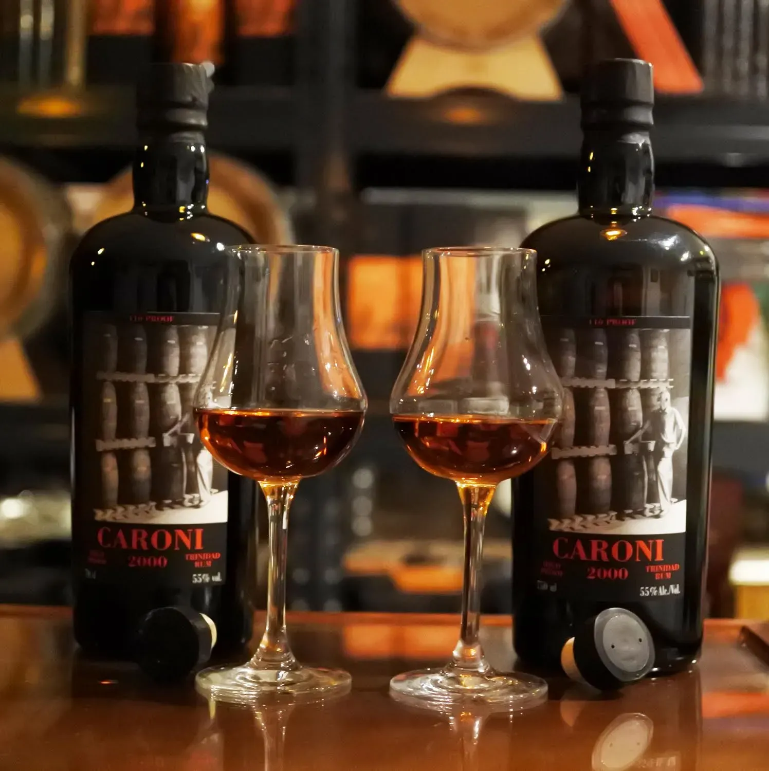 Two Caroni bottles compared side by side, European and US editions