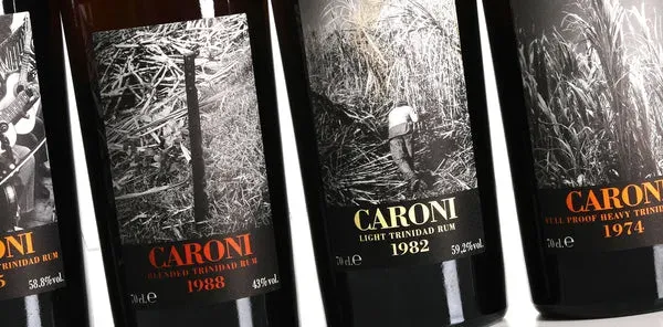 The Caroni Velier range in its iconic black bottle, several bottles lined up